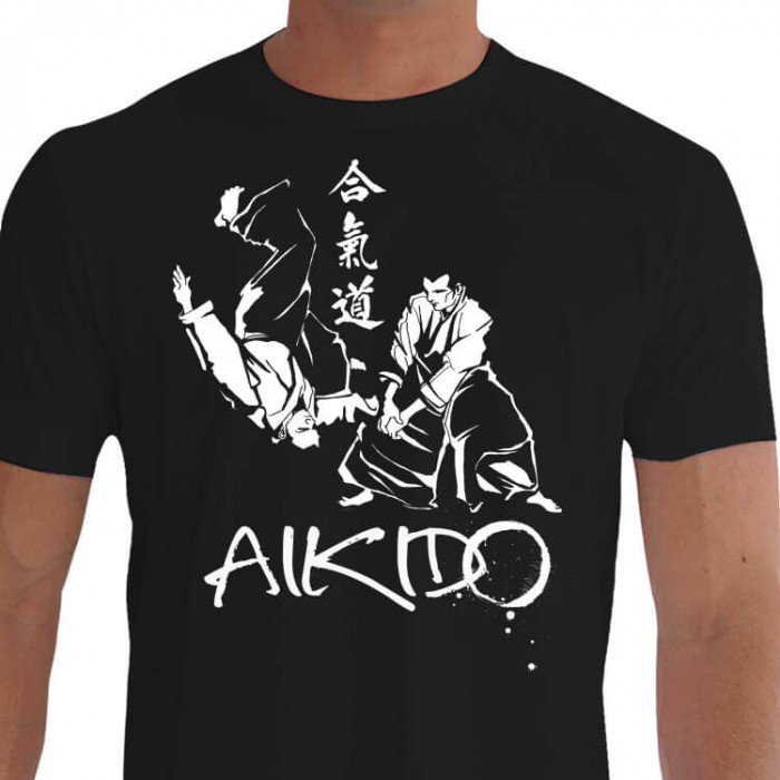 Aikidoka Calça Hakama Aplicando Técnica em Pé Tachiwaza Nikkyo Omote